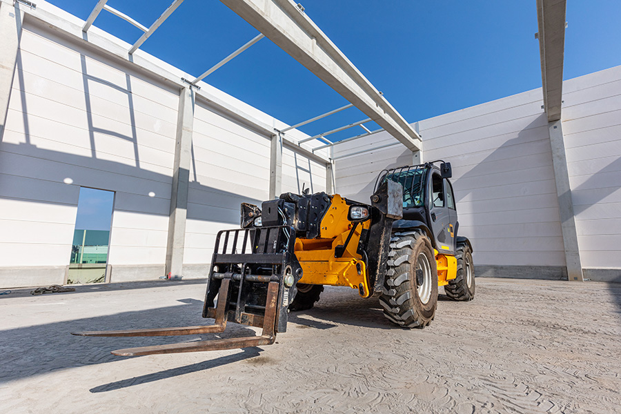 Understanding Different Types of Material Handling Equipment: Telehandler, Material Lift, and Pallet Jack